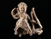 A ROMAN LEAD STATUETTE OF DIANA/ARTEMIS Circa 2nd-3rd century AD. The draped goddess is shown hunting with a bow, pulling an arrow from her quiver. Lo...