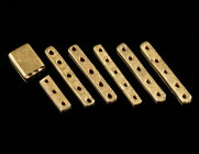 A GROUP OF SEVEN PREHISTORIC GOLD SEPARATORS/DIVIDERS Circa 2nd-1st millennium BC. Seven rectangular separators/dividers from a necklace; pierced and ...