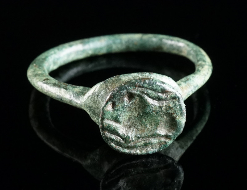 A LATE ANTIQUE/EARLY BYZANTINE BRONZE RING WITH AN ANTELOPE Circa 5th-7th centur...