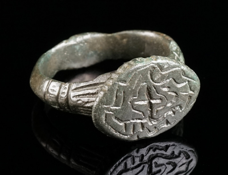 A LATE MEDIEVAL OR EARLY MODERN BRONZE RING Circa 15th-16th century AD. With a p...