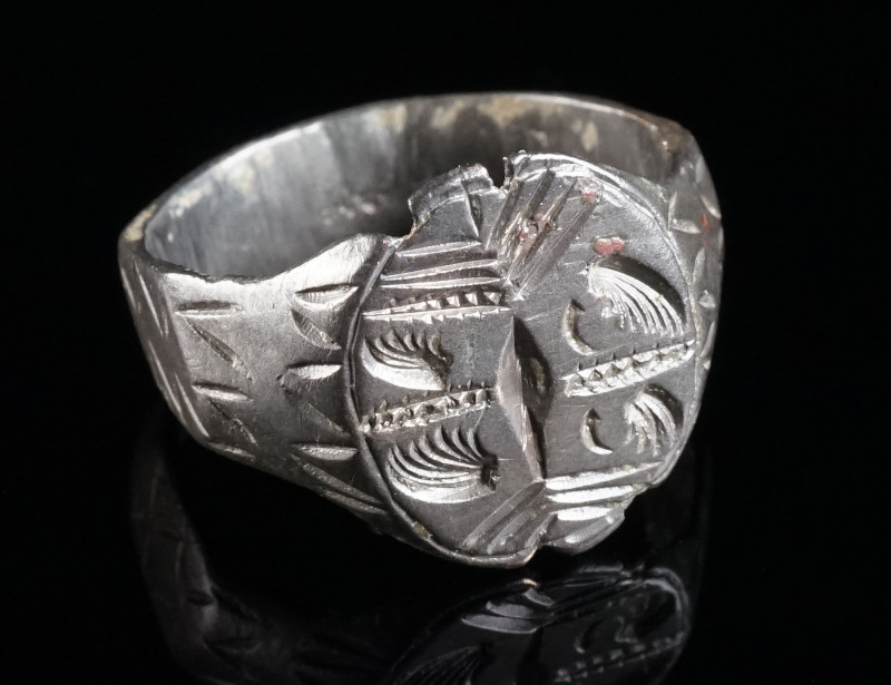 A LATE MEDIEVAL OR EARLY MODERN BRONZE RING Circa 15th-16th century AD. With eng...