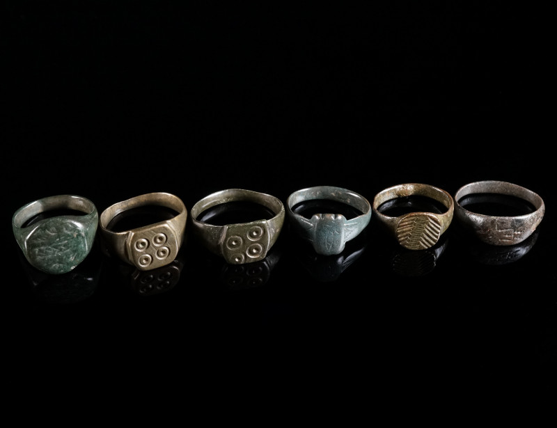 A GROUP OF SIX MEDIEVAL/EARLY MODERN BRONZE RINGS Circa 14th-16th century AD. Al...