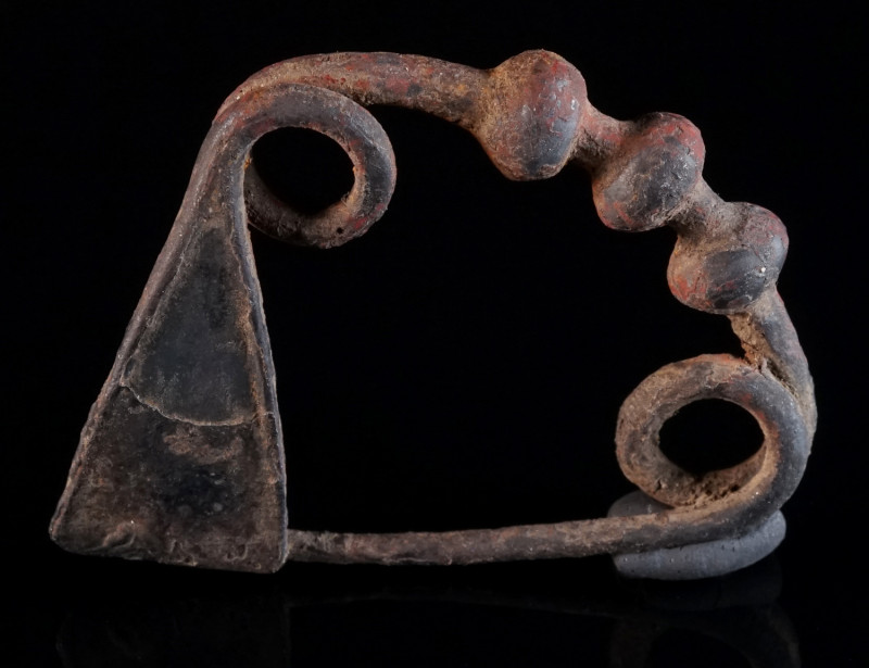 A GRAECO-THRACIAN IRON BOW BROOCH Circa 7th-6th century BC. The bow decorated wi...