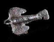 A LATE ANTIQUE BRONZE BIRD BROOCH Circa 4th-6th century AD. Unfinished bird brooch with swept back wings (cast blank). Rare! L 42 mm

Ex European priv...