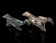 TWO LATE ANTIQUE BRONZE BIRD BROOCHES Circa 4th-6th century AD. One with swept back wings and fantail; the other with folded wings. Pins restored. L 3...