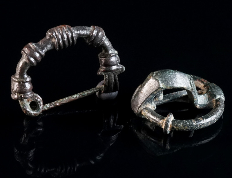 A PHRYGIAN AND A CELTIBERIAN BRONZE BROOCH Circa 6th century BC, and 3rd-2nd cen...