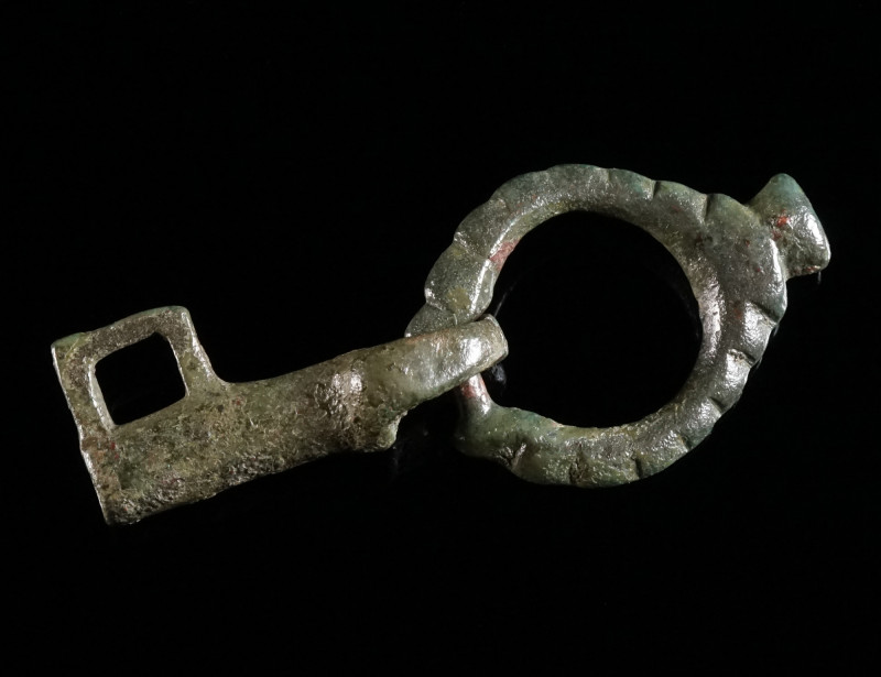 A BYZANTINE BRONZE FOLDING KEY Circa 5th-6th century AD. With hollow shank and k...