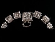A SET OF SEVEN ANTIQUE SILVER FIGURAL BELT FITTINGS Circa 16th-18th century AD (?). All worked in repoussé, decorated with figural and floral motifs. ...