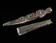 TWO PAIRS OF LATE ANTIQUE/BYZANTINE BRONZE TWEEZERS Circa 4th-7th century AD. Cosmetic tweezers decorated with a series of incised lines/crosses and p...