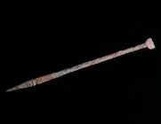 A ROMAN IRON STYLUS Circa 1st-3rd century AD. A well-preserved iron stylus with a pointed end for scratching the characters upon the wax, and a flatte...