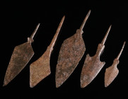 A GROUP OF FIVE MEDIEVAL IRON ARROWHEADS Circa 10th-14th century AD. Four leaf-shaped, and a barbed arrowhead; all with tang. L 61-108 mm

Ex European...