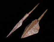 TWO MEDIEVAL IRON TRILOBATE ARROWHEADS Circa 6th-8th century AD, and 10th-14th century AD. A large Avar arrowhead with three wide blades; and a narrow...