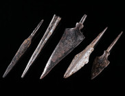 A GROUP OF FIVE MEDIEVAL IRON ARROWHEADS Circa 10th-14th century AD. With different body/head shapes; one with socket (possibly a tool?) L 67-85 mm

E...