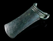 A EUROPEAN LATE BRONZE AGE SOCKETED AXE HEAD Circa 10th-8th century BC. Socketed and looped bronze axe with triple-banded collar. Cutting edge slightl...