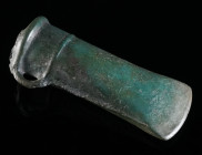 A EUROPEAN LATE BRONZE AGE SOCKETED AXE HEAD Circa 10th-8th century BC. Socketed and looped bronze axe with banded collar. L 10.6 cm

Austrian private...