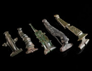 A GROUP OF FIVE EARLY ROMAN BRONZE BROOCHES Circa 1st-early 2nd century AD. Various forms, some still with niello and remains of tinning. All hinged, ...