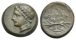 LUCANIA. Thourioi. Circa 280-270 BC. (Bronze, 15.06 mm, 3.07 g). Laureate head of Apollo to left. Rev. ΘΟΥΡΙΩΝ Winged thunderbolt; below, monogram of ...