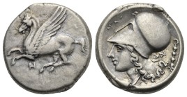 AKARNANIA. Anaktorion. Stater (Silver, 20 mm, 8.45 g). Circa 350-300 BC. Pegasus flying left with pointed wing, below monogram, AN. Rev. Helmeted head...