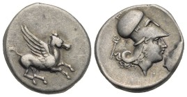 AKARNANIA. Leukas. Circa 350-320 BC. Stater (Silver, 21.00 mm, 8.45 g) Pegasus flying to right; below, Λ (only slightly visible). Rev. Head of Athena ...