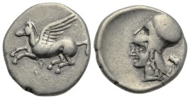 CORINTHIA. Corinth. Circa 405-345 BC. Stater (Silver, 20.72 mm, 8.46 g). Pegasos flying to left, below, Ϙ. Rev. Head of Athena to left, wearing Corint...