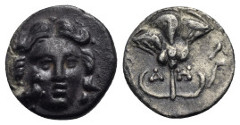 CARIA. Mylasa. Circa 180-140 BC. Drachm (Silver, 13.77 mm, g). Pseudo-Rhodian type. Facing head of Helios with eagle superimposed on right cheek. Rev....