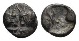 CARIA. Uncertain mint ('Mint D'). Circa 500-480 BC. Tetartemorion (Silver, 7.60 mm, 0.42 g), Milesian standard. Confronted foreparts of two bulls with...