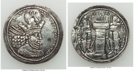 SASANIAN KINGDOM. Shapur II (AD 309-379). AR drachm (27mm, 4.05 gm, 3h). About XF. Bust of Shapur II right, wearing mural tiara with korymbos; Pahlavi...