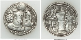 SASANIAN KINGDOM. Varhran II (AD 276-293). AR drachm (26mm, 4.35 gm, 3h). VF. Bust of Varhran II right, wearing winged crown with korymbos, and Prince...