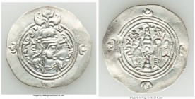 SASANIAN KINGDOM. Queen Buran (AD 630-631). AR drachm (33mm, 4.14 gm, 3h). VF. SK (Sakastān) mint. Dated Regnal Year 3 (AD 631). Bust of Queen Buran r...
