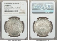 Republic 8 Reales 1815 PTS-F UNC Details (Environmental Damage) NGC, Potosi mint, KM14. A piercing glare from the sun face emits from amidst a sea of ...