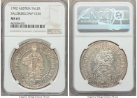 Salzburg. Johann Ernst Taler 1702 MS63 NGC, KM254, Dav-1234. A choice offering with fully struck features and glasslike fields which exhibit a delicat...