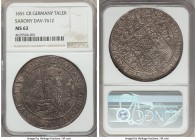 Saxony. Johann Georg I Taler 1651-CR MS62 NGC, KM425, Dav-7612. Fully original with a rich graphite tone throughout. Nearly all detail is full, result...