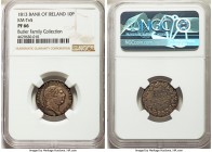 George III Proof 10 Pence Token 1813 PR66 NGC, KM-Tn5. An enchanting gem with interwoven silver, sunset, and emerald tones. Conditionally scarce in th...