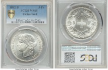 Confederation 5 Francs 1892-B MS65 PCGS, Bern mint, KM34, HMZ-21198e. A blast white gem with needle point devices and delicious satiny surfaces.

HID9...