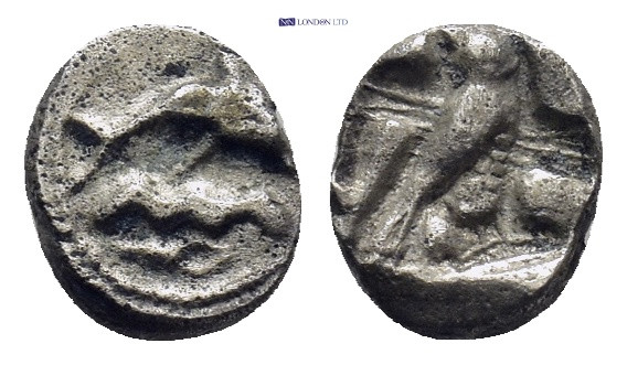 PHOENICIA, Tyre. Mid 5th century BC. AR 1/24(?) Shekel (0.64 Gr. 8mm.).
 Dolphin...