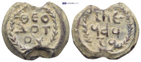 Byzantine lead seal (15.66Gr. 25mm.) Obv:Legend in three lines. Rev:Legend in three lines.