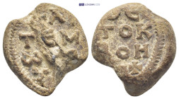 Byzantine Lead Seal (20mm, 10.5 gr) Obv: Legends in three lines. Rev: Legends in four lines.