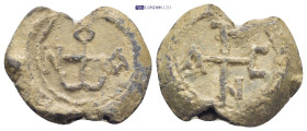 Byzantine lead seal (8.92Gr. 22mm.) Obv:Cruciform invocative monogram. Rev:Cruciform invocative monogram.