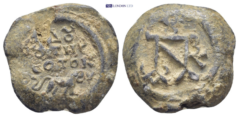 Byzantine lead seal (11.65Gr. 22mm.) Obv:Legend in three lines, lion below.. Rev...