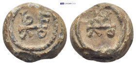 Byzantine lead seal (7.94Gr. 16mm.) Obv: Monogram. Rev:Monogram