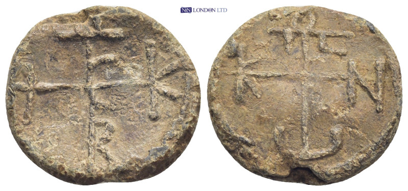 Byzantine lead seal (8.17Gr. 21mm.) Obv:Cruciform invocative monogram. Rev:Cruci...