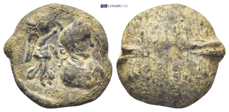 Lead Seal (18mm, 5.43 g) Obv: Laureate bust of Emperor right. Nike holding wreat...