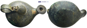 Bronze lamp with carinated body and round-topped nozzle. Has a lid in shape of shell. (131mm, 304.7 g)