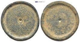 Byzantine Commercial Weight (4-6th centuries) Obv: Ornament with cross above. Rev: Blank (31mm, 39.8 g)