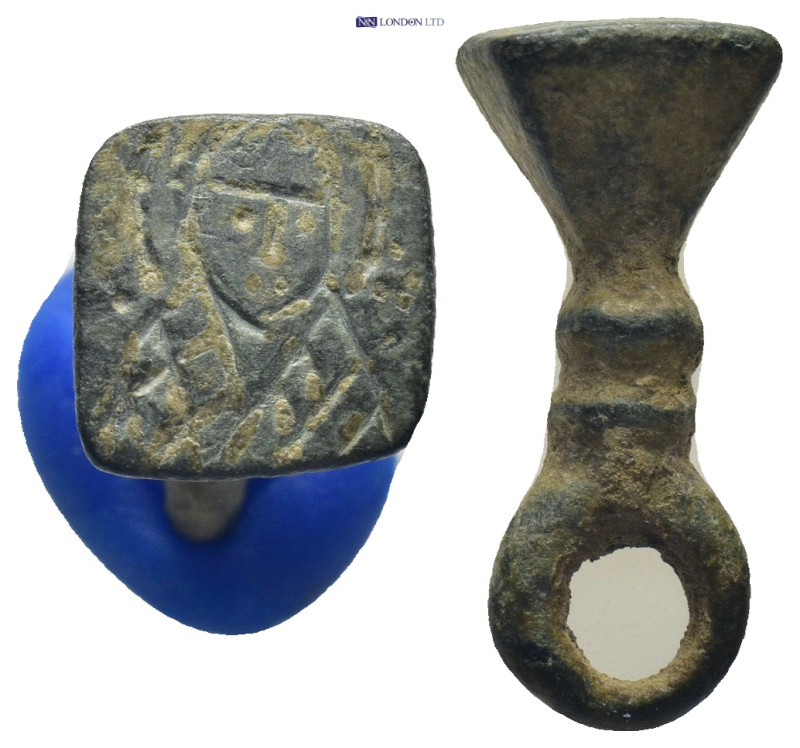 Byzantine bronze stamp seal. Conical-shaped seal, loop at top for suspension. Sa...