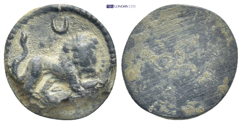 Bronze lid decorated lion walking to the left. crescent above (4 Gr. 18mm.) SOLD...