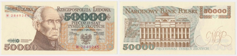 50.000 złotych 1989 - W Delikatne, zanikające ugięcie poziome dochodzące do port...