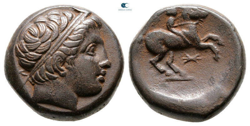 Kings of Macedon. Uncertain mint. Philip II of Macedon 359-336 BC. 
Bronze Æ
...