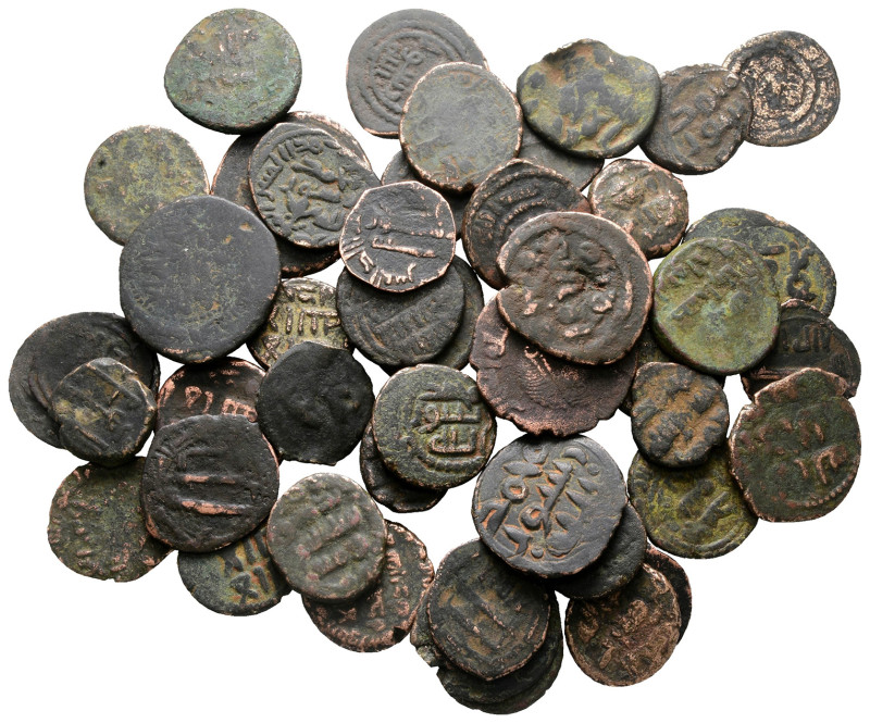 Lot of ca. 50 islamic bronze coins / SOLD AS SEEN, NO RETURN!

Good Fine