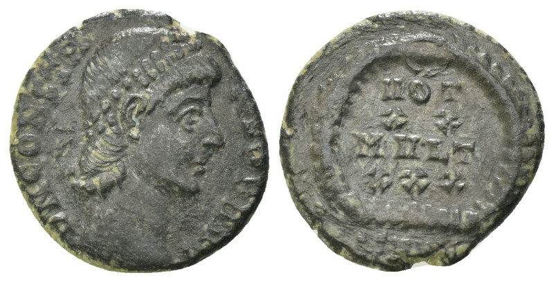 Constans. (347-348 AD). Æ Follis. Antioch. Obv: D N CONSTANS P F AVG. pearl-diad...